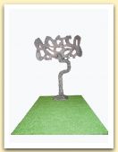 L'albero arrugginito, ferro, stucco, prato sintetico, 42x56x13, 2007.jpg