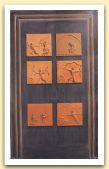 Porta di Apollo, 2000, legno e sei formelle in terracotta, cm 228x136.jpg